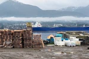 Cooke Aquaculture Pacifics work area and office west of the Coast Guard station on Ediz Hook serves the companys salmon farm. Photo by Paul Gottlieb/Peninsula Daily News