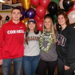 Redmond High athletes signed letters of intent to play in college on Feb. 7. They are, from left to right, Ilan Piker, soccer, Cornell; Mara Kipnis, softball, Williams College; Natalie Daub, soccer, Hawaii; and Cameron Kieneker, soccer, Eastern Washington. Courtesy of Brian Kipnis