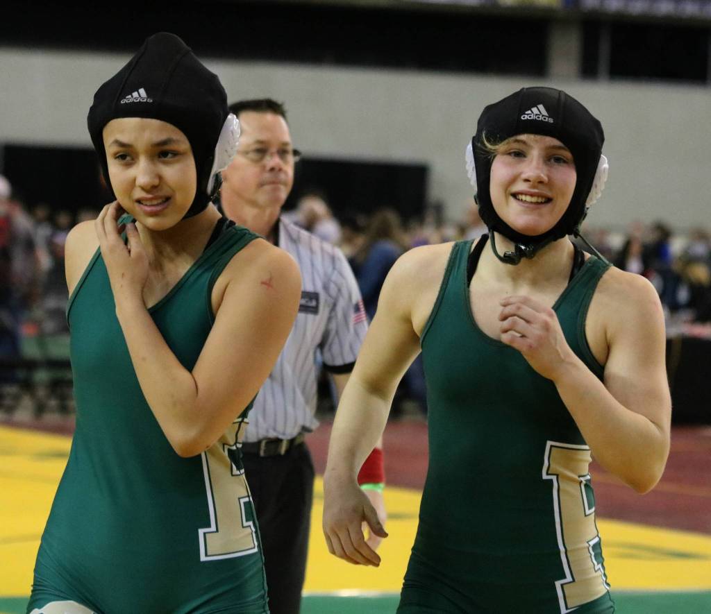 Redmonds Hiatt, left, and Williams following their match. Williams took fifth and Hiatt took sixth. Andy Nystrom, Reporter