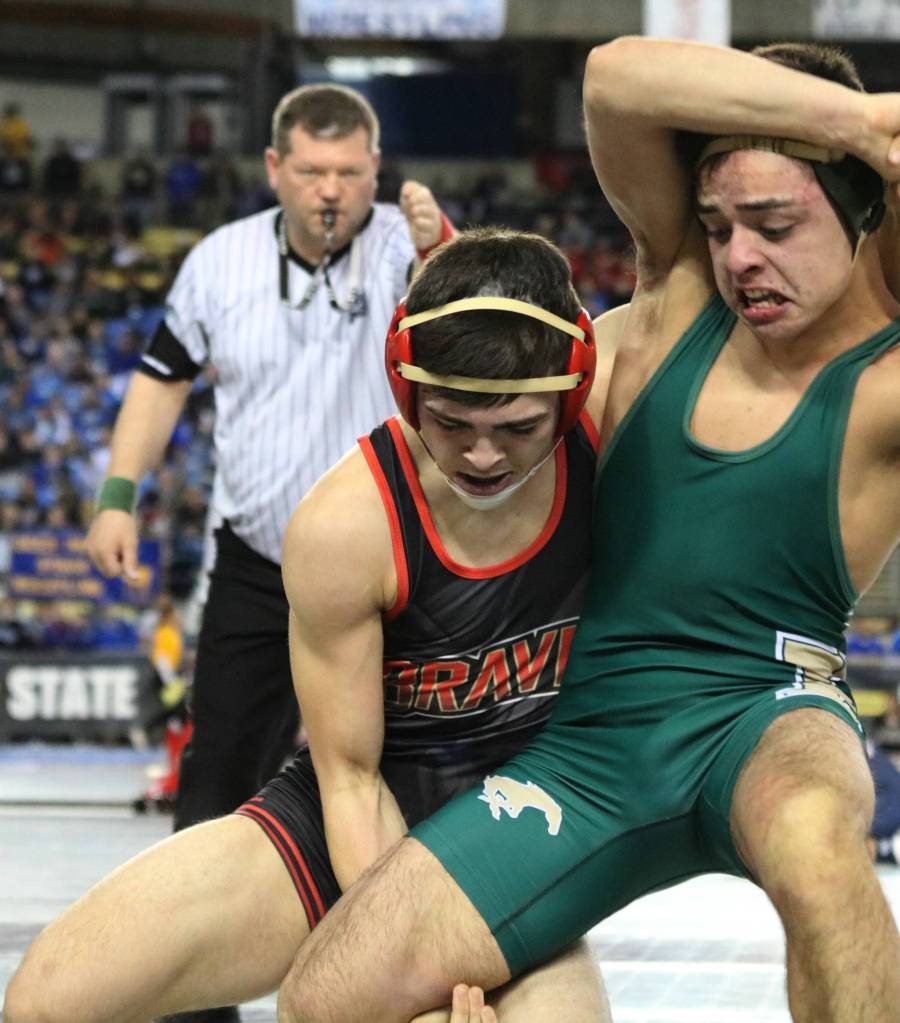 Redmonds Jeremy Hernandez, right, battles Kamiakins Joey Chavez in the state semifinals. Andy Nystrom, Reporter