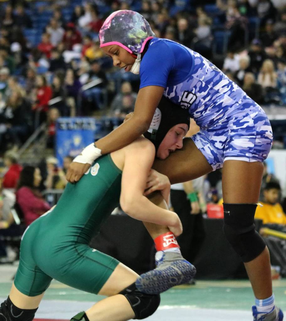 Redmonds Molly Williams, bottom, competes at state. Andy Nystrom, Reporter
