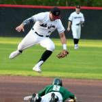 Andy Nystrom, staff photo                                Redmond Mustangs freshman Colin Curry (pictured below) stole second base in the top of the second inning against the Mercer Island Islanders in a KingCo 3A baseball playoff game on May 3 at Bannerwood Park in Bellevue. Mercer Island defeated Redmond 7-6.