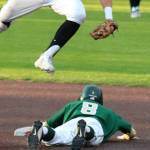 Andy Nystrom, staff photo                                Redmond Mustangs freshman Colin Curry (pictured below) stole second base in the top of the second inning against the Mercer Island Islanders in a KingCo 3A baseball playoff game on May 3 at Bannerwood Park in Bellevue. Mercer Island defeated Redmond 7-6.
