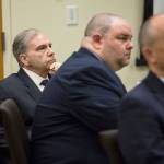 John Blaine Reed (left) accused of murdering Monique Patenaude and Patrick Shunn, listens as Snohomish County chief criminal deputy prosecutor Craig Matheson makes opening statements in his trial at the Snohomish County Courthouse on Thursday in Everett. (Andy Bronson / The Herald)