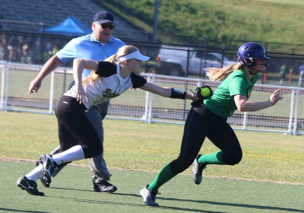 Redmonds Camille Eaton tags out a Roosevelt runner on Tuesday. Andy Nystrom / staff photo