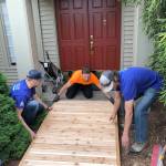 Volunteers build access ramps for locals