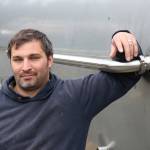 DeLille Cellars winemaker Jason Gorski stands in front of an old beer brewing vat which was removed from the old Redhook brewery. The cellar is moving its operations to the Woodinville location. Aaron Kunkler/Staff photo