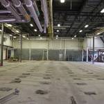 A view of the warehouse which will be converted into a winery by DeLille Cellars at the old Redmond brewery in Woodinville. This building formerly housed beer brewing vats which were removed, temporarily leaving large holes in the concrete floor. Aaron Kunkler/Staff photo
