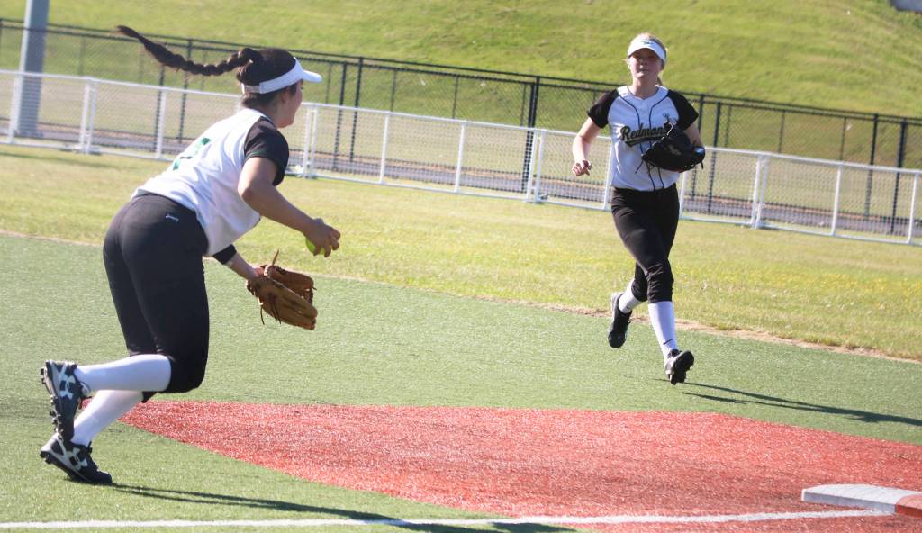 Redmonds Lindsay Tsujikawa, left, and Camille Eaton both garnered 3A KingCo first-team honors. Andy Nystrom / staff photo