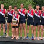 Senior Justin Buckley (pictured fourth from right) missed The Bear Creek Schools Class of 2018 graduation ceremony on June 9 to row for Sammamish Rowing Associations Varsity 8+ in the U.S. Junior National Championship at Lake Natoma in Rancho Cordova, California. They took 13th in 6:18.7. His shell won the Pacific Northwest Championship on May 20, setting a course record at 5:58.12 in the 2,000-meter event. Next year, Buckley will compete on the lightweight rowing team at Yale University, where he plans to study math, computer science and music. Heres a list of all the athletes pictured at the PNW championship: Jack Ulmer (Sammamish), Jason Pyke (Bellevue), Landon Fick (Bellevue), Max Mason (Redmond), Logan McKerlich (Sammamish), Buckley (Redmond), Jonny Smith (Sammamish), and Adam Hamshou (Bellevue), as well as SRA mens coach Eliza Dickson. In front holding their trophy is coxswain Sam Lalor (Sammamish). The other seniors in the boat were Pyke and McKerlich, both of whom will be rowing for the University of Washington; Smith, who will be rowing at Western Washington University; and Ulmer, who will row at the University of Wisconsin. Courtesy photo