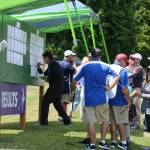 People gather around the results board. Andy Nystrom / staff photo