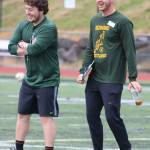 Redmond High coaches Antonio Medina, left, and Trevor Tangen share a laugh at camp. Andy Nystrom /staff photo