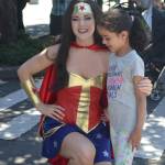 A young resident poses for a photo with Wonder Woman. Katie Metzger/staff photo