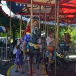 Kids enjoy the merry-go-round at Derby Days in Redmond. Katie Metzger/staff photo