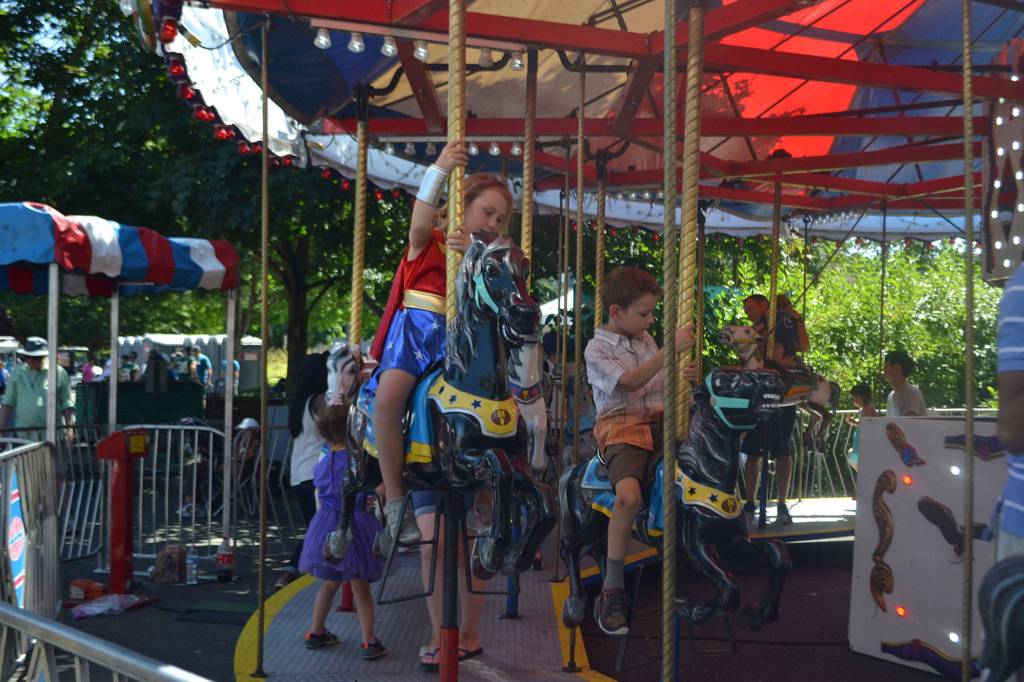 Kids enjoy the merry-go-round at Derby Days in Redmond. Katie Metzger/staff photo
