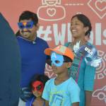 A family poses for a photo booth picture at Derby Days in Redmond. Katie Metzger/staff photo