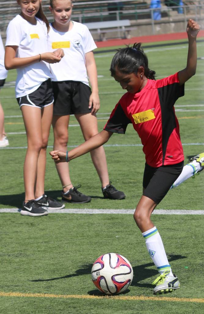 A camper shoots on goal. Andy Nystrom / staff photo
