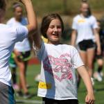 Camper Yvette Williams gives a high five after scoring a goal. Andy Nystrom / staff photo