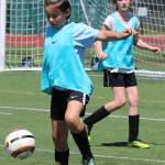 One camper prepares to dribble the ball up field. Andy Nystrom / staff photo