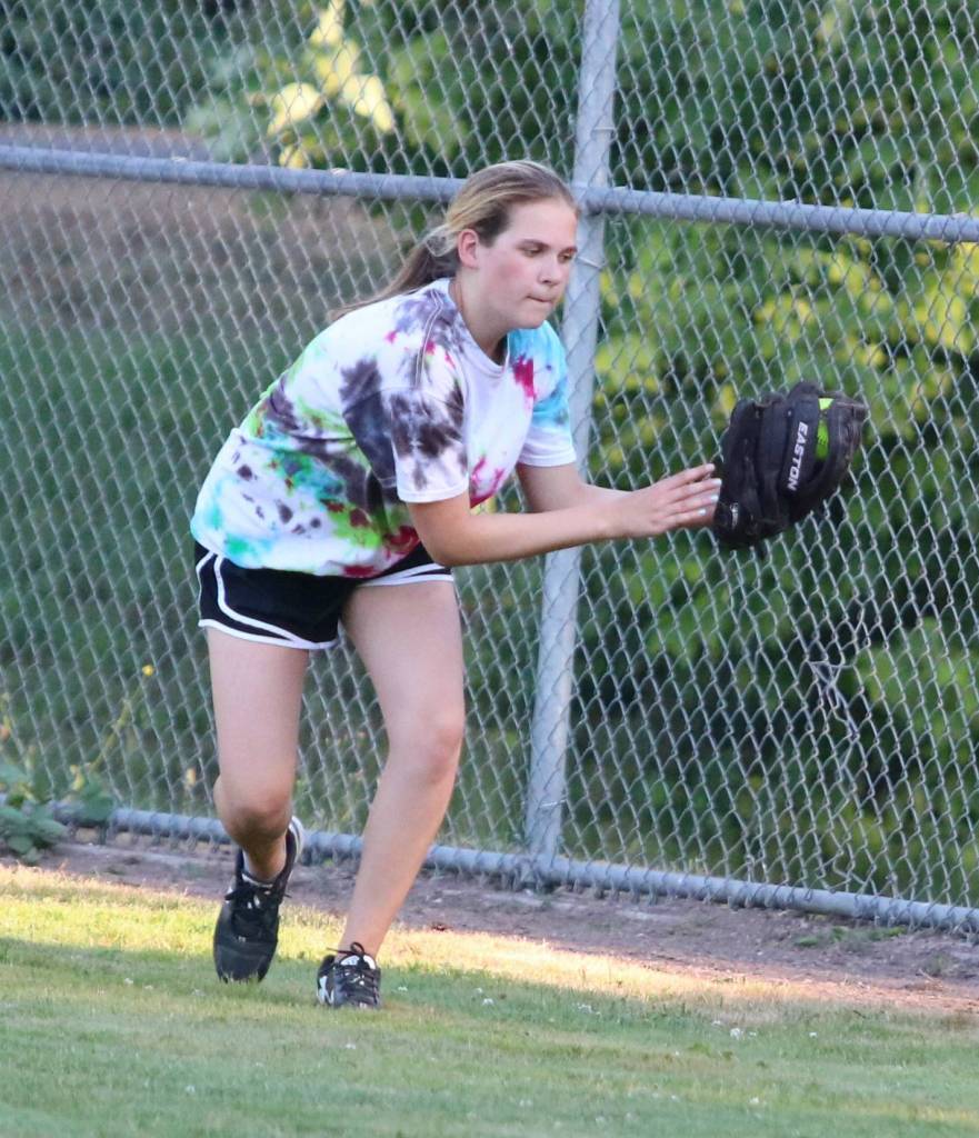 Isabella Stewart snags a flyball during practice. Andy Nystrom / staff photo