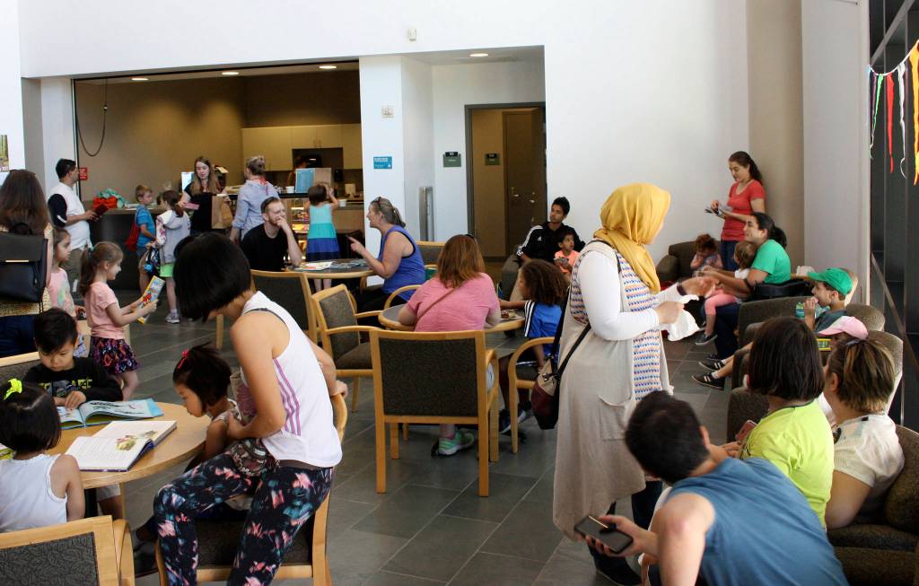 More than 50 Redmond locals came and went throughout the Little Free Library opening at the Redmond Community Center. Kailan Manandic, Redmond Reporter