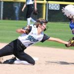 Redmonds Karli Kostoff tags out a Central runner in Tuesdays game at the Junior Softball World Series. Central won, 10-6. Andy Nystrom / staff photo