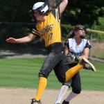 Redmonds Sundis Cole tags out a runner to start a double play. All photos by Andy Nystrom / staff