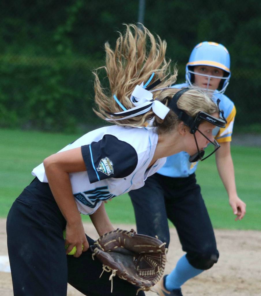 Karli Kostoff makes a play at shortstop.