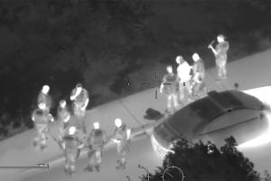 Bellevue police arrest the suspect as seen from as seen from King County Sheriffs Guardian One helicopter. Screenshot from the King County Sheriff Air Support YouTube page