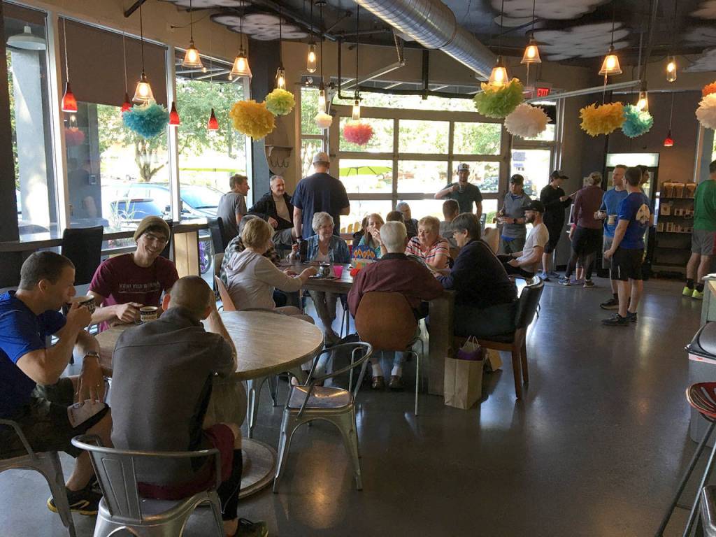 F3 members meet for coffee at the Down Pour Coffee Bar in Redmond after the workout. Reporter Kailan McGruff Manandic sits with Jason AP Silverstein and Christian Xbox Benn (left). Photo Courtesy of Brian Dilfer Gawthrop