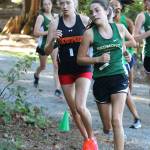 Redmond High sophomore Chloe Connolly, right, took second in 19 minutes, 50 seconds versus Newport and Woodinville. Newport senior Alyssa Bienfang, left, won the race in 19:49. Andy Nystrom / staff photo