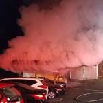 Fire crews put out a vehicle fire caused by an unknown arsonist in the early hours of Sept. 28 in Redmond. Photo courtesy of Redmond Police