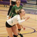 On the ball: Redmond Highs Megan Golembeski, front, and Mari Torgerson, back, during their Oct. 25 match. Andy Nystrom / staff photo