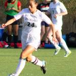Overlakes Kayla Ngai moves the ball up field while Serena Home follows in the background. Photo courtesy of David Chudzik