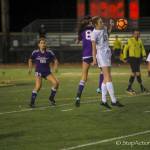 Redmond defender Taylor Pisan (No. 17) battles for possession of the ball against Issaquah in the Wes-King 4A girls district soccer tournament championship game. Issaquah outscored Redmond 4-2 in penalty kicks in an overtime shootout, earning a 1-0 victory on Nov. 1 at Gary Moore Stadium in Issaquah. Photo courtesy of Don Borin/Stop Action Photography