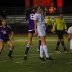 Redmond defender Taylor Pisan (No. 17) battles for possession of the ball against Issaquah in the Wes-King 4A girls district soccer tournament championship game. Issaquah outscored Redmond 4-2 in penalty kicks in an overtime shootout, earning a 1-0 victory on Nov. 1 at Gary Moore Stadium in Issaquah. Photo courtesy of Don Borin/Stop Action Photography