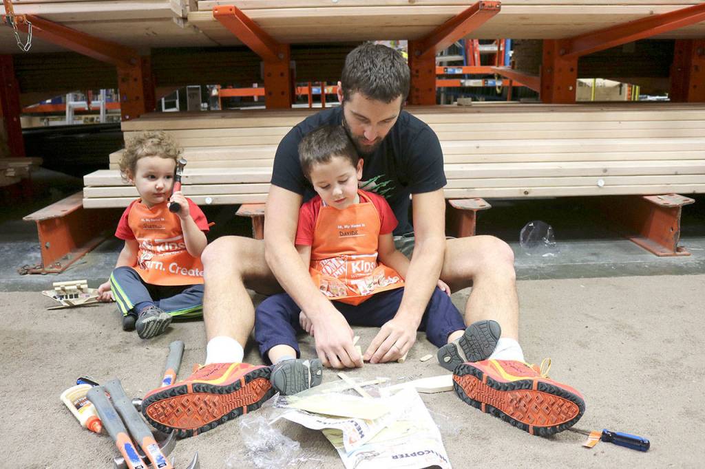 This month families had the opportunity to celebrate and honor all who served in a hands-on Veterans Day focused workshop. Families built custom model military helicopters. Stephanie Quiroz/staff photo.