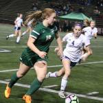 Redmonds Lindsey Honhart (16), left, dribbles the ball up field against Bellarmine Prep. Andy Nystrom / staff photo