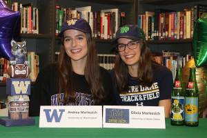 Markezich twin runners sign letters of intent