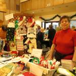 Eileen Hart was one of many vendors selling their wares at the Holiday Market at the Redmond Senior Center during Redmond Lights. Samantha Pak/staff photo
