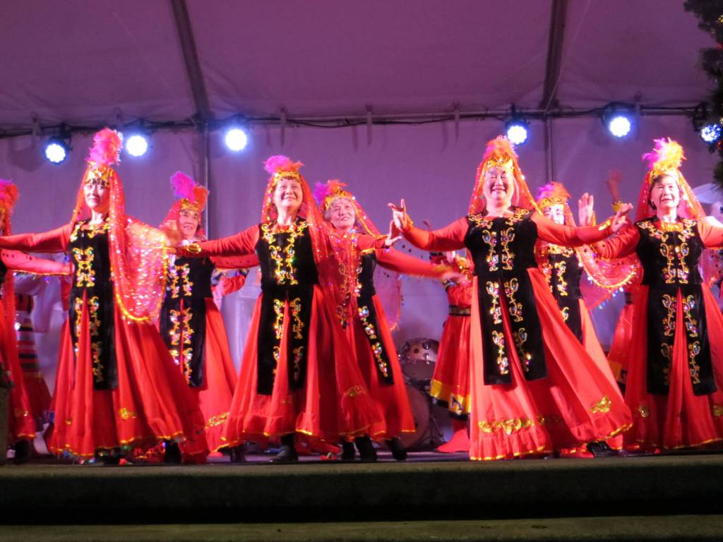 Members of the Huayin Performing Arts Group showcase various minority groups cultures from China during Redmond Lights on Dec. 1. Samantha Pak/staff photo