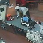 The two suspects wore dark masks to conceal their faces. Redmond police are still investigating this crime. Photos courtesy of the Redmond Police Department