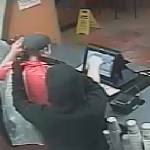 The two suspects wore dark masks to conceal their faces. Redmond police are still investigating this crime. Photos courtesy of the Redmond Police Department