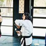 Defense Ninjas instructor Fauzia Lala demonstrates self-defense techniques to the women in her class. Photo via Instagram