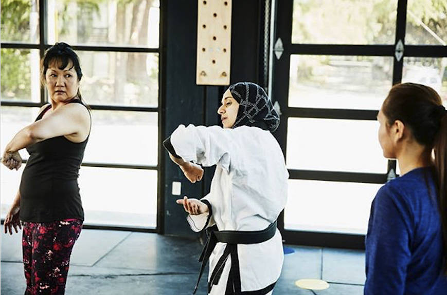 Defense Ninjas instructor Fauzia Lala demonstrates self-defense techniques to the women in her class. Photo via Instagram