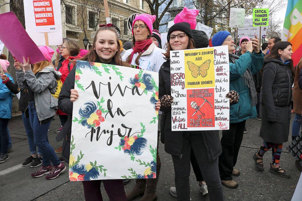 Seattle Pacific University students Delaney Palmer and Bridgett Palmer attended the Womxns March on Jan. 19 for the second time. They said its important to fight back. Stephanie Quiroz/staff photo.