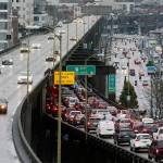 Southbound traffic backs up as northbound drivers cruise on with ease on the State Route 99 viaduct three days before its closure. Andy Bronson/The Herald