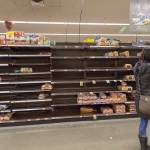 Customers decide on their bread choice at the QFC in Redmond on Feb. 8. Ashley Hiruko/staff photo