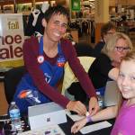 Assistance League of the Eastside volunteers raise more than $400,000 annually for Operation School Bell, which lets 3,500 local children select new back-to-school apparel at Fred Meyer shopping events.