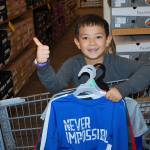 Assistance League of the Eastside volunteers raise more than $400,000 annually for Operation School Bell, which lets 3,500 local children select new back-to-school apparel at Fred Meyer shopping events.